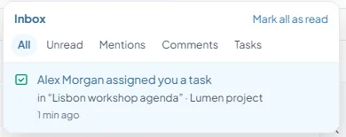 Le panneau Inbox dans l'application web : les onglets All, Unread, Mentions, Comments et Tasks, Mark all as read, et l'entrée Alex Morgan assigned you a task, in "Lisbon workshop agenda" · Lumen project, 1 min ago