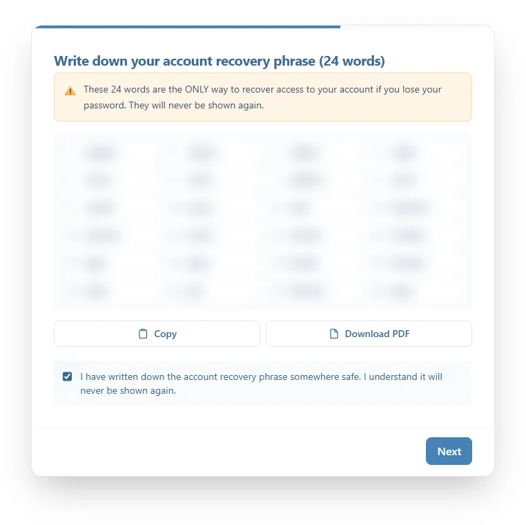 The Write down your account recovery phrase (24 words) screen: the words, blurred on purpose, the Copy and Download PDF buttons, and the confirmation box ticked