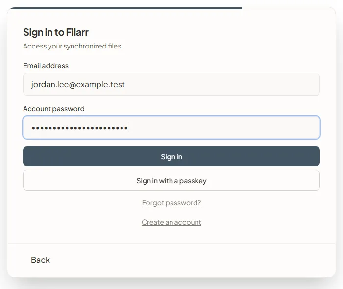 The sign-in step of the web app: Sign in to Filarr, the email address and password fields, Sign in, Sign in with a passkey, Forgot password? and Create an account